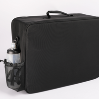Travel Bag C80B4500 in black, 56x38x18cm, 1791g. Durable polyester, ideal for cyclists, with anti-scratch material, three composite pressure structures, customizable compartments, and a breathable upper pocket. Back view.
