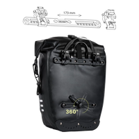 Back view of the black Corsino Journey Pannier Bag 27L showing the durable quick-release mounting system for easy and secure installation.
