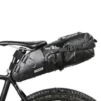 Corsino Explorer Seat Pack 13L securely attached under a bike saddle, demonstrating easy installation and ample storage capacity for cycling adventures.