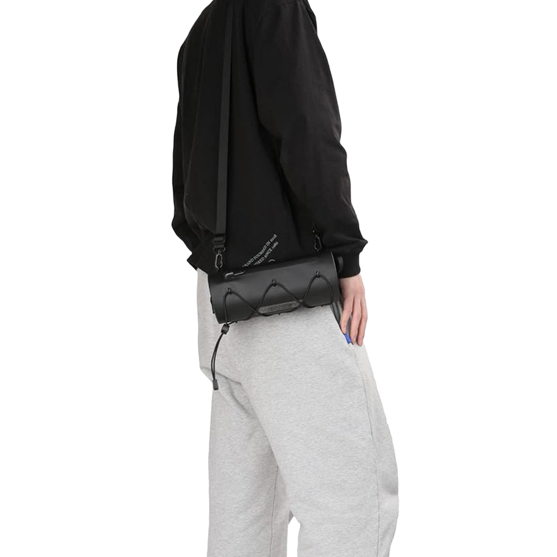 Olive Corsino Force Bike Handlebar Bag worn on a shoulder with the included strap, highlighting its versatile carry options for cyclists.