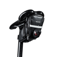 Saddle Bag in black, attached to a bike saddle and seat post, made of water-resistant polyester. Dimensions: 19x11x11cm, weight: 80g.