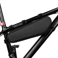 The Corsino Shortcut 2.5L frame bag securely mounted to a black bicycle frame using its versatile five adjustable Velcro straps, including an adjustable bottom strap for a perfect fit
