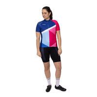 Model wearing the premium Corsino Always women's cycling top. Highlighting the secure internal silicone waistband gripper that guarantees the moisture-wicking jersey stays locked perfectly in position during intense road climbs and fast descents.