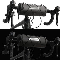 Black Corsino Force Bike Handlebar Bag attached to a bike shown in normal and low-light conditions, highlighting the reflective Corsino logo for better visibility at night.