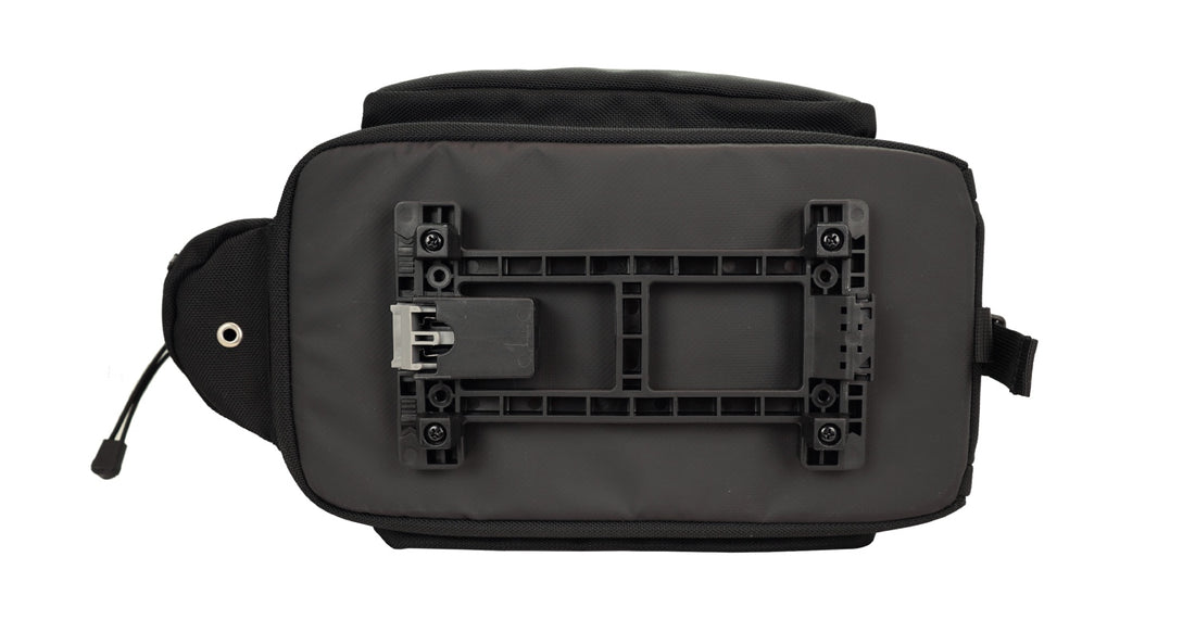 Bottom view of the Corsino Adventure 12L rear bike bag showcasing the integrated MIK 2.0 system plate, enabling quick and secure attachment to compatible bicycle racks