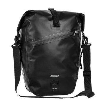 Front view of the black Corsino Journey Pannier Bag 27L with the detachable shoulder strap attached, showcasing its waterproof 500D PVC twill construction.