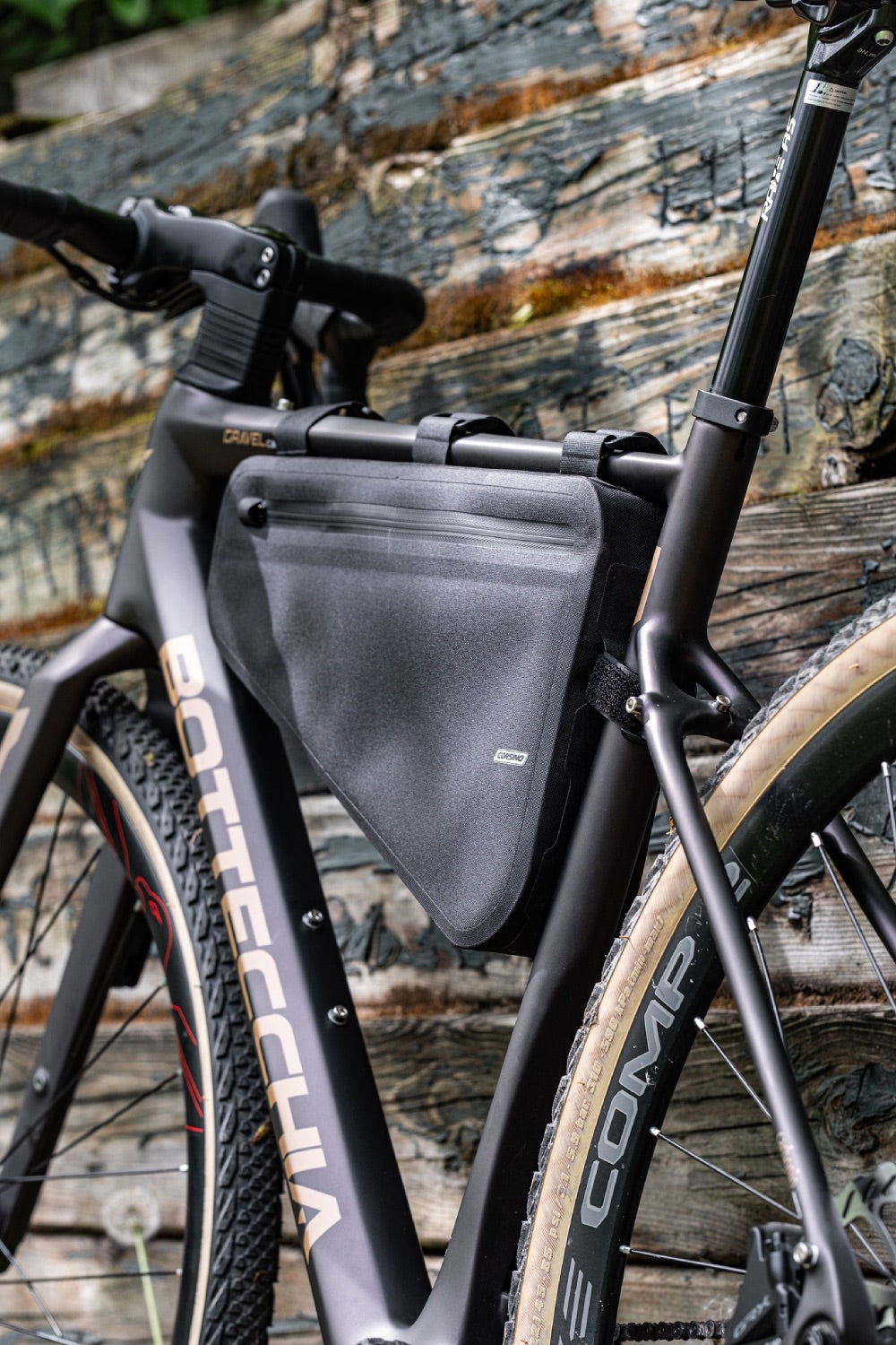 Structural view of the Corsino Excursion bikepacking bag highlighting the innovative 3-layer support design. This premium feature effortlessly maintains the pack's wind-cheating shape and structure even when fully loaded with heavy cycling tools.