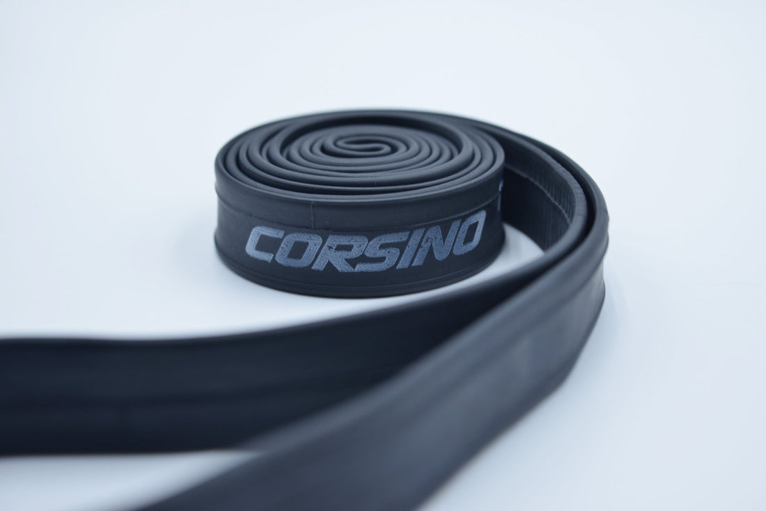 The Corsino 700c road cycling inner tube neatly rolled and ready to pack into your saddle bag. Crafted from high-elasticity rubber to instantly replace blown tires and get you back to high-speed riding without the constant worry of pinch flats.