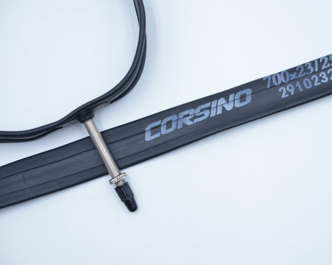 The Corsino 700x23/25C Road Bike Inner Tube. Engineered with highly durable, premium rubber, this exact-fit replacement tube guarantees superior puncture resistance and reliable high-pressure performance for serious road cyclists.