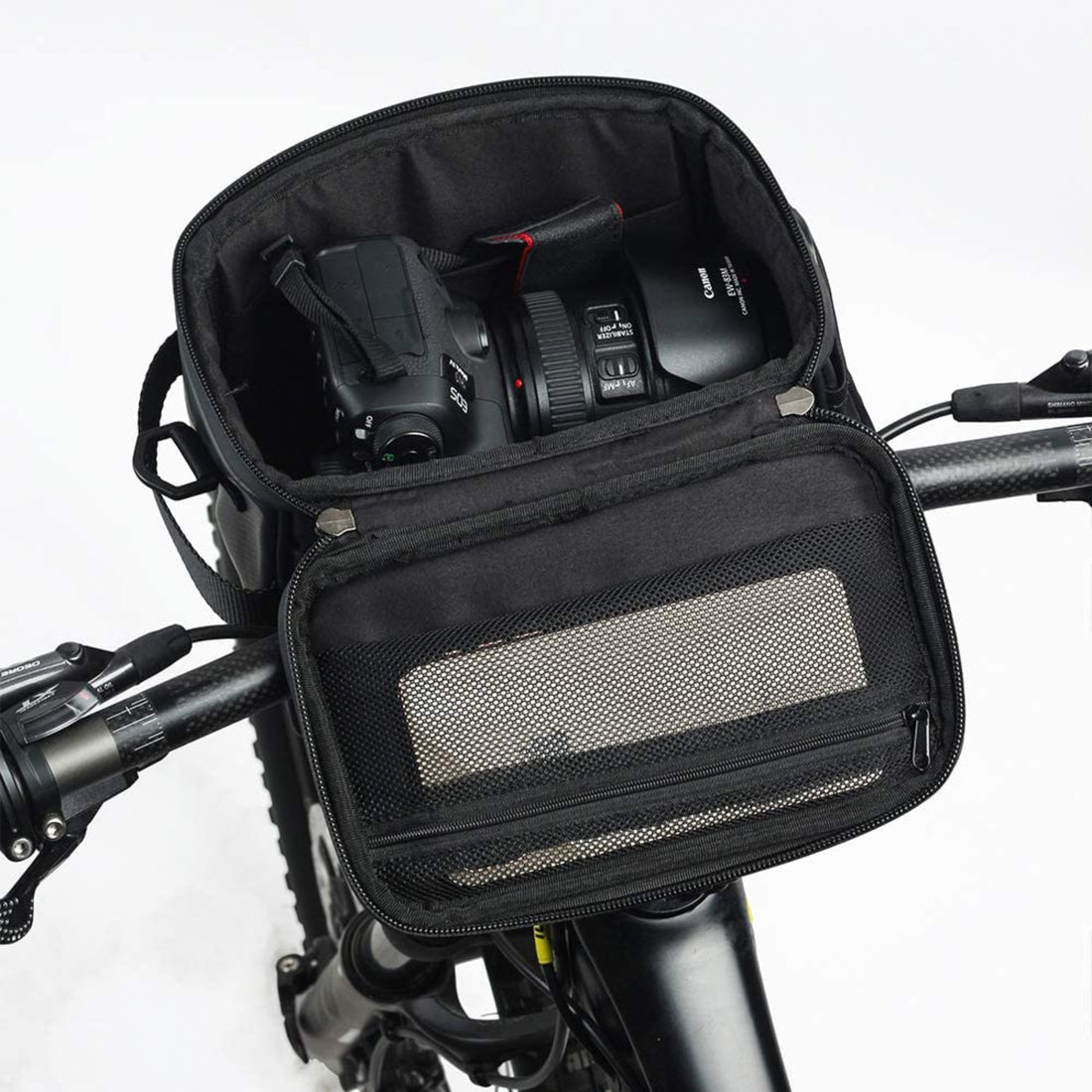 Interior detail of the Corsino Rover 4.5L cycling bag revealing the thick 5mm elastic foam sidewalls. This multilayer shock-absorbing padding creates a secure, bounce-free vault for delicate DSLR cameras and extra lenses