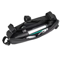 Open Corsino Shortcut 2.5L road bike storage bag revealing its highly organized interior, easily fitting a hand pump, CO2 cartridges, and phone within the inner zippered compartment and two side pockets