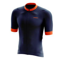 Front profile of the navy blue Corsino Tremblant Men's Short Sleeve Jersey, highlighting the full-length covered zipper and breathable Forma fabric body