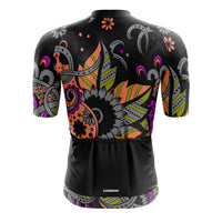 Detailed back view of the black Tribal jersey featuring a full-length covered zipper and specialized Forma fabric for maximum breathability during professional training