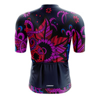 Rear view of the navy blue Tribal jersey showing three storage pockets, one secure zip pocket, and reflective bands to enhance safety for high-visibility road cycling
