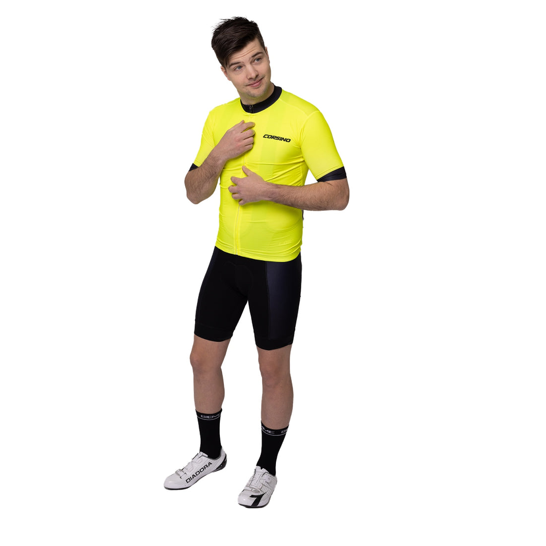 Front view of a male model wearing the high-visibility yellow Corsino Tremblant short sleeve jersey, showcasing the comfortable anti-static carbon fabric structure on the road
